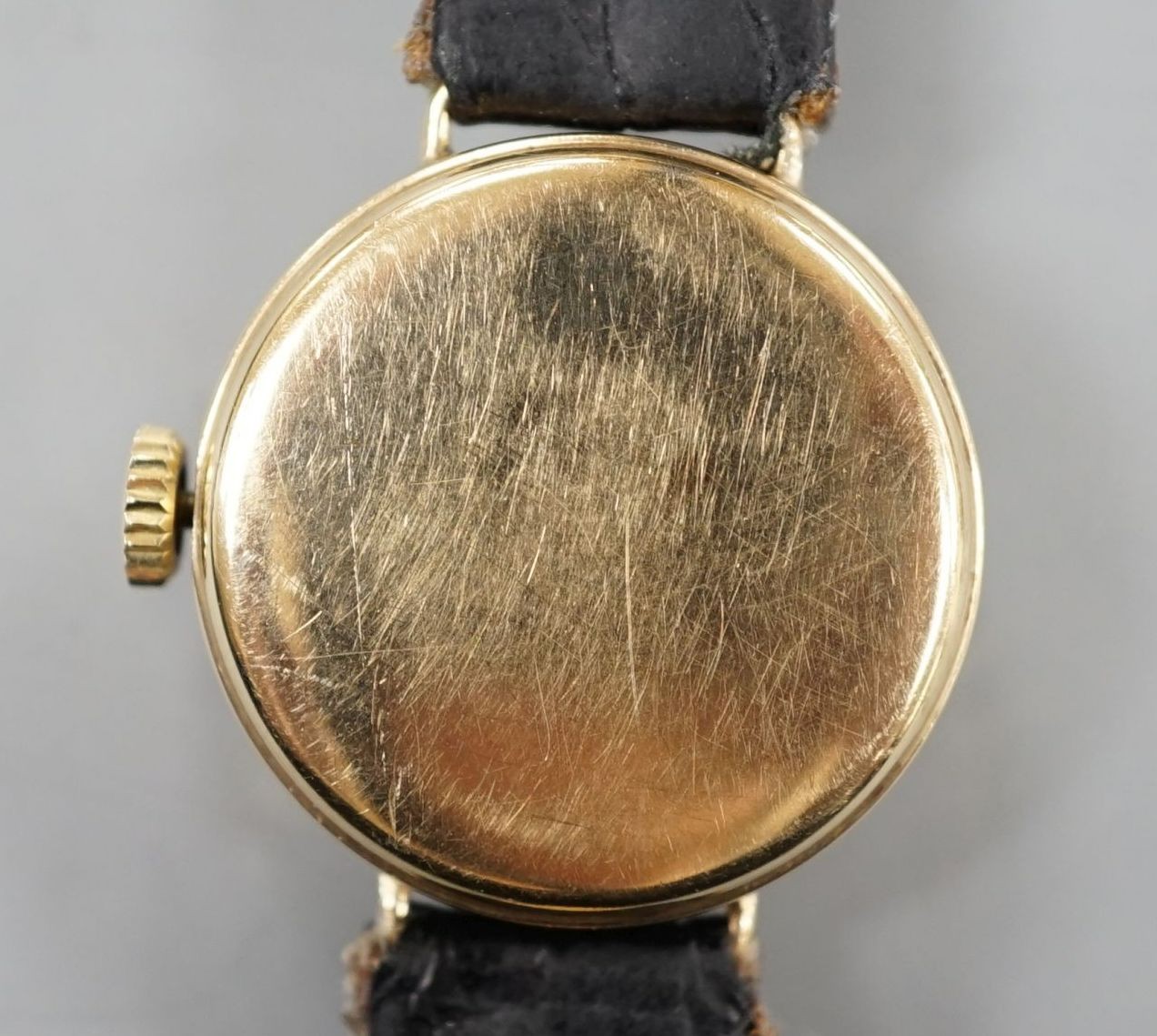 A lady's early to mid 20th century 9ct gold manual wind wrist watch, on later leather strap